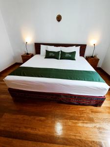 Postel nebo postele na pokoji v ubytování 7th Wonder Apart Hotel Cusco