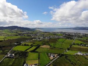 an aerial view of a town next to a body of water at Sally's Vineyard in Buncrana