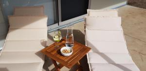 an overhead view of a table inbetween two chairs at Neureum Park Luxury Eco Villas in Kilkivan