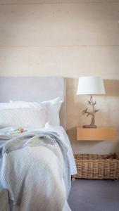 Ένα ή περισσότερα κρεβάτια σε δωμάτιο στο Forest Rise Chalets and Lodge