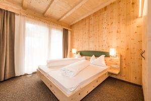 Postel nebo postele na pokoji v ubytování Hotel Panorama