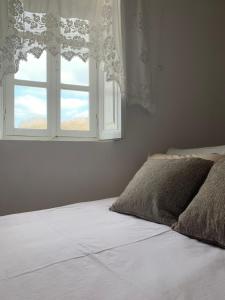 Postel nebo postele na pokoji v ubytování Lava House