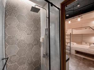 Rúm í herbergi á Hotel Leisure Chiayi