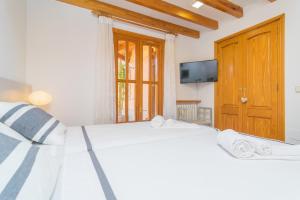 Łóżko lub łóżka w pokoju w obiekcie Villa Marjals 16