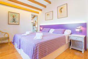 Łóżko lub łóżka w pokoju w obiekcie Villa Marjals 16