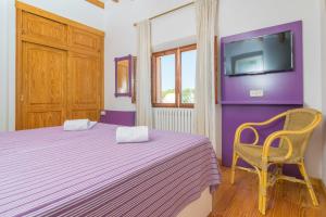 Łóżko lub łóżka w pokoju w obiekcie Villa Marjals 16