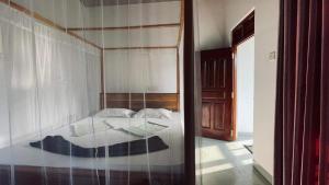 Säng eller sängar i ett rum på Kiara Sands