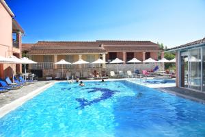 a swimming pool with a number in the water at Spyridoula Resort in Corfu in Gouvia