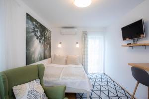 Postel nebo postele na pokoji v ubytování House 24 Bled