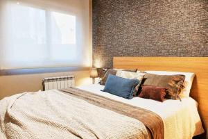 A bed or beds in a room at Apartamento Mariscal