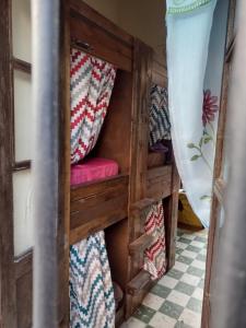 a room with bunk beds in a house at HOSTAL SAN PANCHO in San Luis Potosí