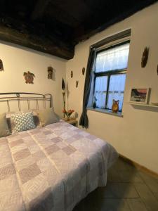 Gulta vai gultas numurā naktsmītnē La Casa nei Vicoli: in Centro a Due Passi dal Lago