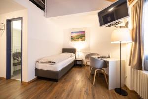 TV a/nebo společenská místnost v ubytování Hotel Restaurant Alte Brauerei