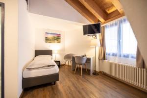 Postel nebo postele na pokoji v ubytování Hotel Restaurant Alte Brauerei
