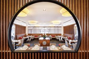 Ресторан / й інші заклади харчування у Asia Hotel & Spa Leoben