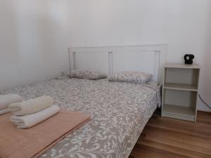 Postel nebo postele na pokoji v ubytování Apartmani Dejan