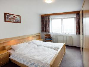 Postel nebo postele na pokoji v ubytování Apartment in Ötztal near Ski Slopes