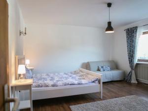 Ein Bett oder Betten in einem Zimmer der Unterkunft Apartment Dorota 2