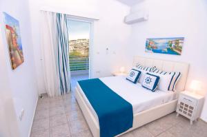 A bed or beds in a room at Villa Sea Horizon