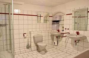 Vonios kambarys apgyvendinimo įstaigoje Altstadt Apartments