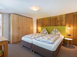 Postel nebo postele na pokoji v ubytování House in H ttau near Salzburg Airport