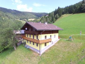 an aerial view of a house in a field at Modern Chalet in Wagrain with Balcony in Wagrain