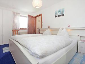 Postel nebo postele na pokoji v ubytování Apartment in Stuhlfelden near Ski Lift