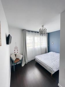 Postel nebo postele na pokoji v ubytování NEW: appartement tout confort + parking gratuit