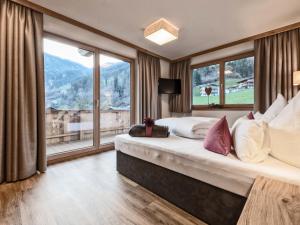A bed or beds in a room at Farmhouse in Schwendau near Ski Zillertal