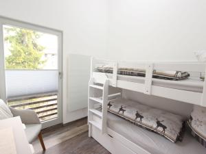Postel nebo postele na pokoji v ubytování Apartment in Kirchdorf near Ski Slopes