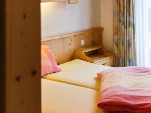 Posteľ alebo postele v izbe v ubytovaní Apartment in Saalbach near Ski Slopes