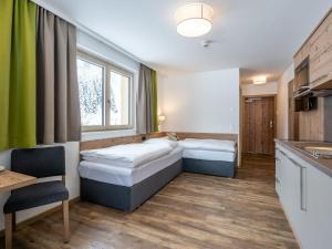 Posteľ alebo postele v izbe v ubytovaní Chalet with sauna and Jokercard in summer