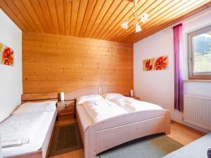 Postel nebo postele na pokoji v ubytování Mountain-view Apartment in Ramsau