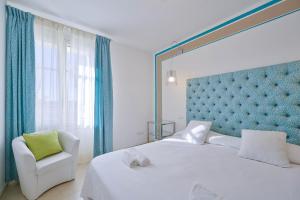 Postel nebo postele na pokoji v ubytování Villa Onofria + 37 fotografií