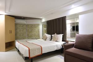 Postel nebo postele na pokoji v ubytování Hotel Supreme - Cuffe Parade + 37 fotografií