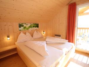 Posteľ alebo postele v izbe v ubytovaní Chalet in Hohentauern near Ski Lift