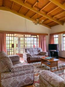 Χώρος καθιστικού στο Oilepo Cottage
