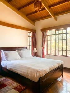 Ένα ή περισσότερα κρεβάτια σε δωμάτιο στο Oilepo Cottage