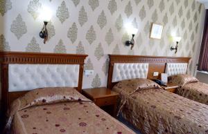 Voodi või voodid majutusasutuse Hotel Ebru Antique toas