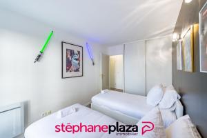 Кровать или кровати в номере Plaza Star Wars Appartement +13 фотографий