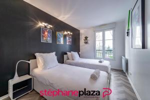 Кровать или кровати в номере Plaza Star Wars Appartement