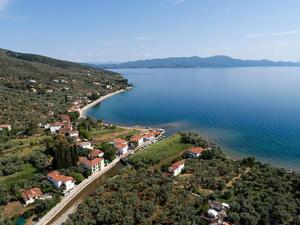 an aerial view of a large body of water at Bill's Garden Villa in Kalamos