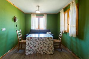 Posedenie v ubytovaní Apartamentos Turísticos Matagacha