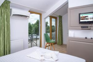 Μια τηλεόραση ή/και κέντρο ψυχαγωγίας στο Paradis Hotel