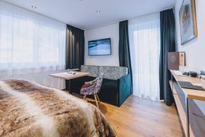 Fotografie z fotogalerie ubytování Dorfkrug Kaprun - Luxury Suites & Appartements v Kaprunu