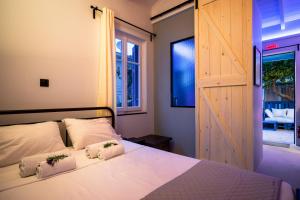 Katil atau katil-katil dalam bilik di Tiny Smart House Kefalonia
