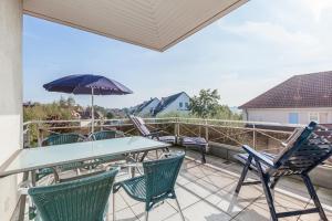 Ein Balkon oder eine Terrasse in der Unterkunft Waterkant Wohnung 19 - Klabautermann