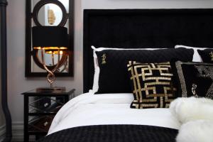 Säng eller sängar i ett rum på The Clyne at Utopia Penthouse by MGroupSA