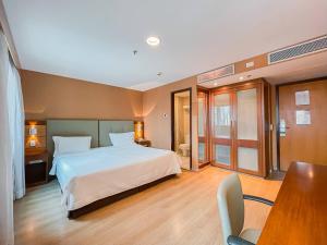 Ένα ή περισσότερα κρεβάτια σε δωμάτιο στο M N Flats - Flat Dentro Do Hotel WI Avenida Ibirapuera 2927 +40 φωτογραφίες