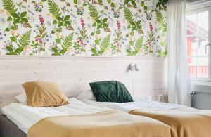 Letto o letti in una camera di Hotell Gyllene Hornet